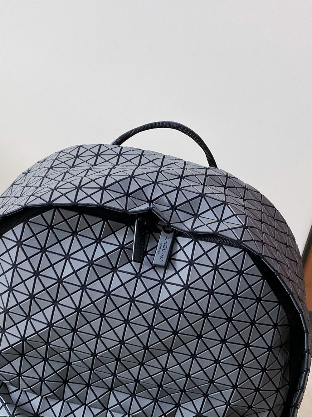 Issey Miyake Reflective Triangular-Panel Gray Backpack - Picture 6 of 9
